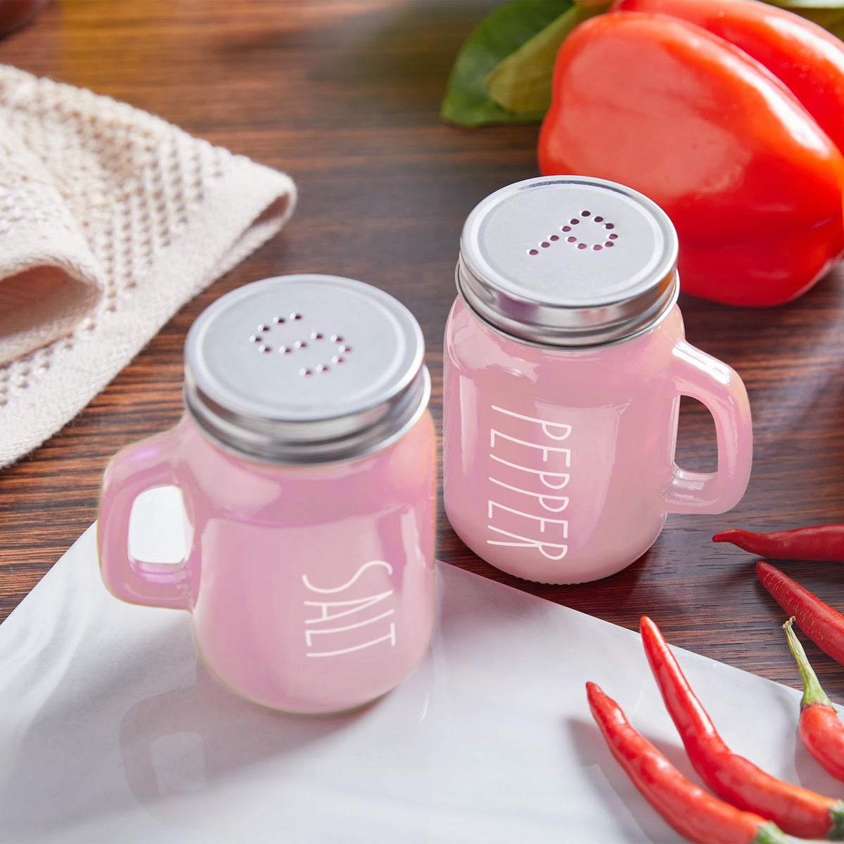 ZOSUJO pink shakers shown in hand for comfortable grip.