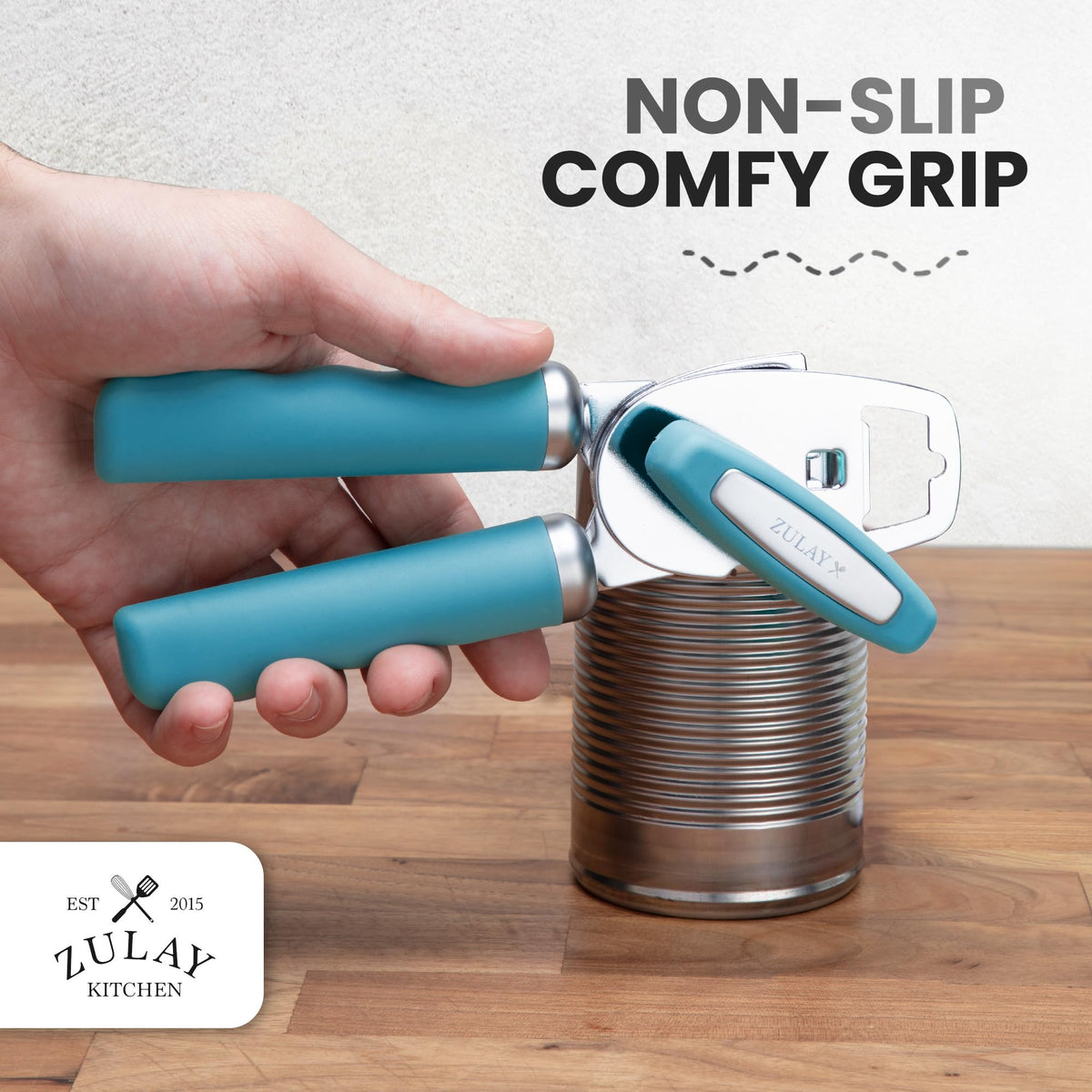 Zulay Kitchen dusty blue can opener in action during operation