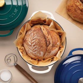 Zulay Kitchen ergonomic ashwood handle Danish whisk in action for comfortable kneading.