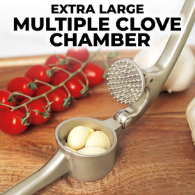 Zulay Kitchen ergonomic handle minimizes effort when mincing unpeeled cloves.