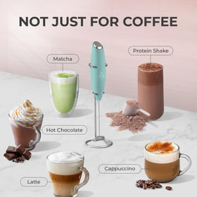 Zulay Kitchen frother in use producing foam on a coffee mug