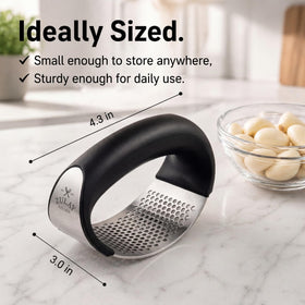 Zulay Kitchen stainless-steel mincer with wide pressing area speeds garlic prep.