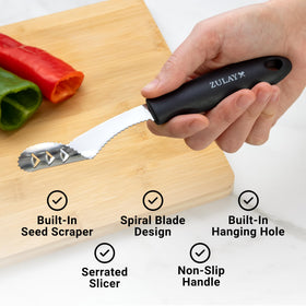 Zulay Kitchen jalapeno core during deseeding process showing clean core removal.