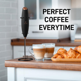 Handheld frother producing rich coffee foam for beverages