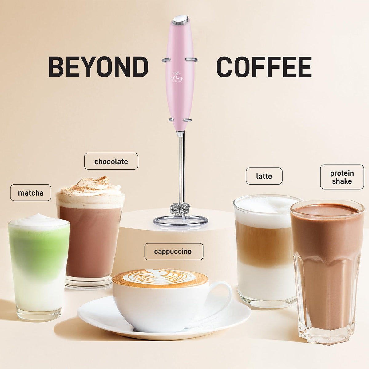 Zulay Kitchen Pink handheld frother in use for latte foam