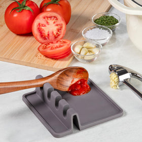 Zulay Kitchen spoon rest in use with ladles, spatulas, and tongs