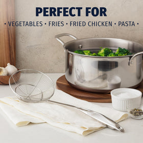 Zulay Kitchen stainless steel skimmer ladle frying use highlights heat resistance and easy maneuvering.