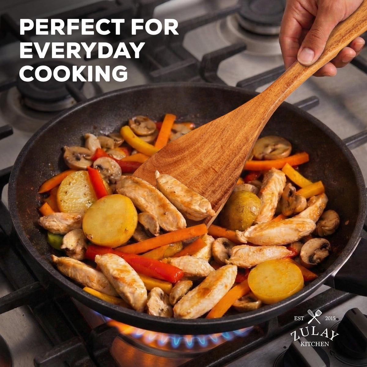 Zulay Kitchen slotted turner lifting foods with minimal sticking