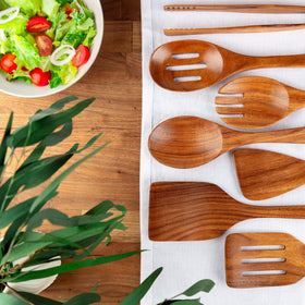Zulay Kitchen teak slotted spoon on natural grain, gentle on surfaces