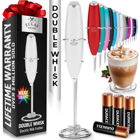 Zulay Kitchen milk frother in use, creating creamy foam in cup