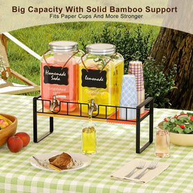 Zuyachuza bamboo stand supports the dispensers for outdoor events