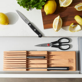ZWILLING beechwood in-drawer organizer keeps knives protected and clutter-free.