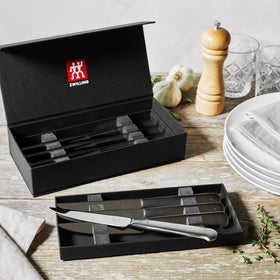 ZWILLING razor-sharp edge enhances clean cuts through thick steaks.