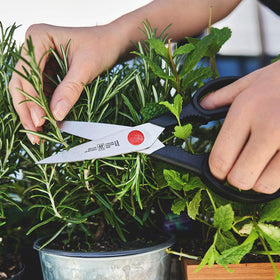 ZWILLING Twin L kitchen shears built-in rotary opener loosens stiff lids with ease.