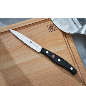 ZWILLING Twin Signature 4-inch paring knife ergonomic handle for comfortable, steady cutting