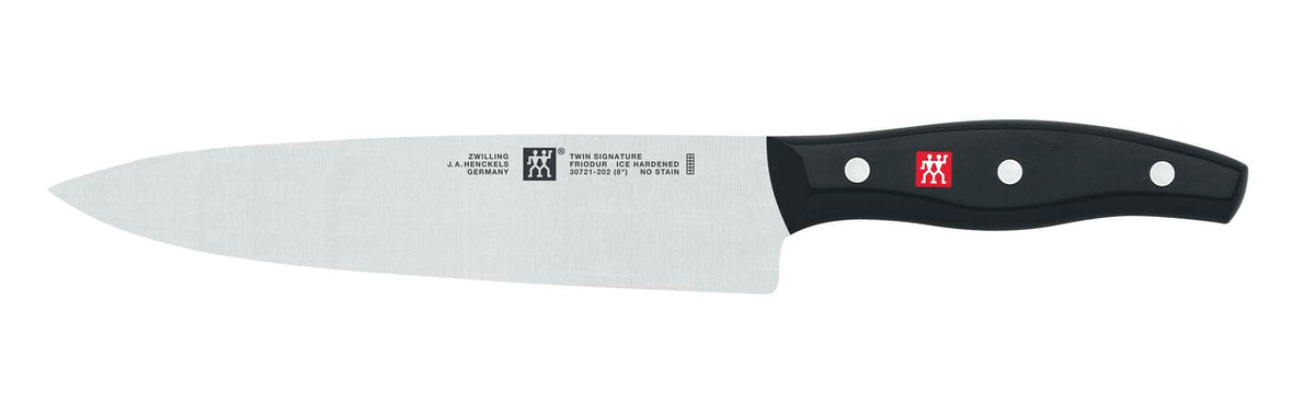 ZWILLING Twin Signature ergonomic triple-rivet handle for balanced control.