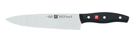 ZWILLING Twin Signature ergonomic triple-rivet handle for balanced control.