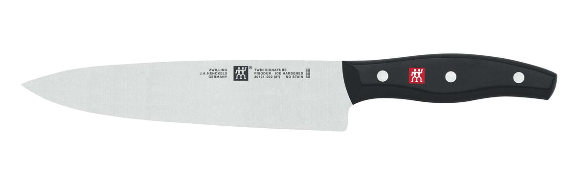 ZWILLING Twin Signature ice-hardened blade resists dulling over time.