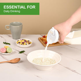 ZWYSLFCY milk carafe with clear body for everyday use.